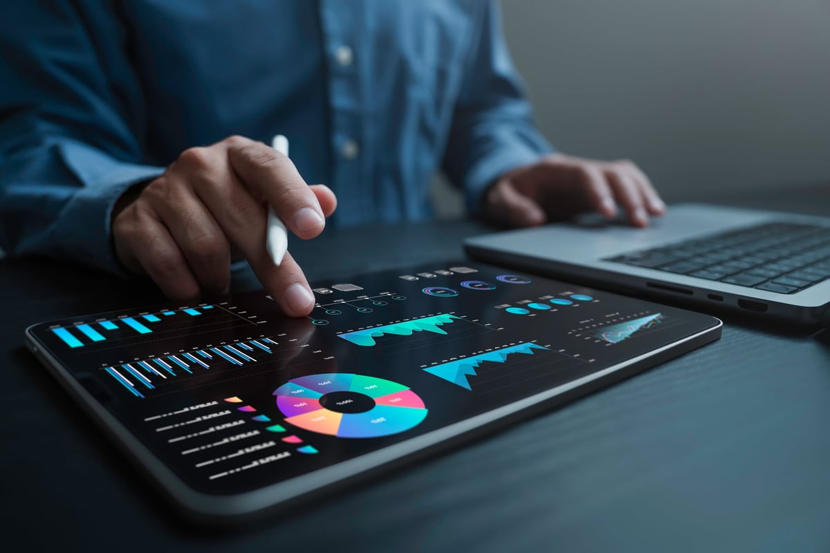 An analyst uses a computer and dashboard for data business analysis and Data Management System with KPI